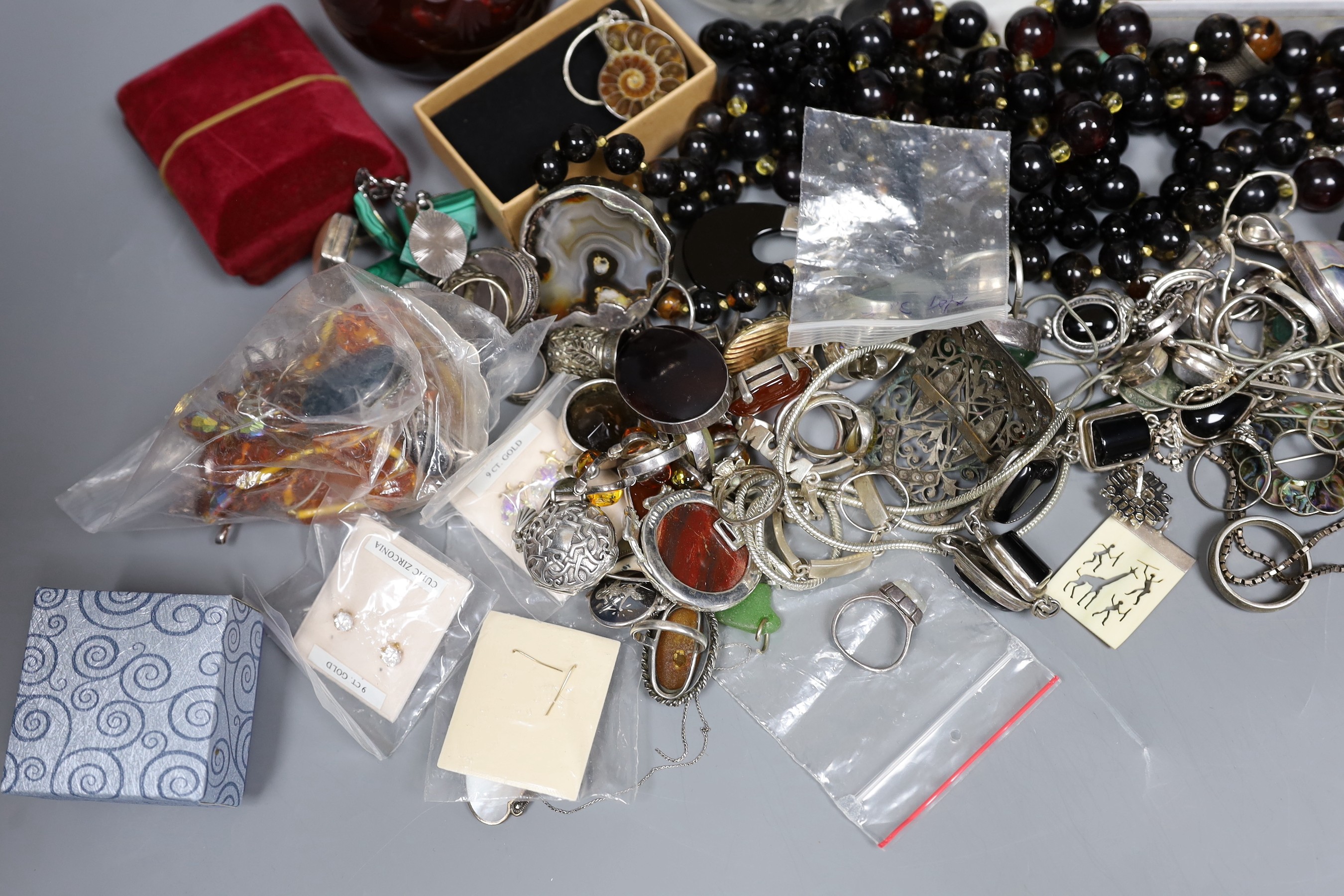 Two silver mounted glass scent bottles including late Victorian ruby glass and a quantity of assorted mainly costume jewellery.